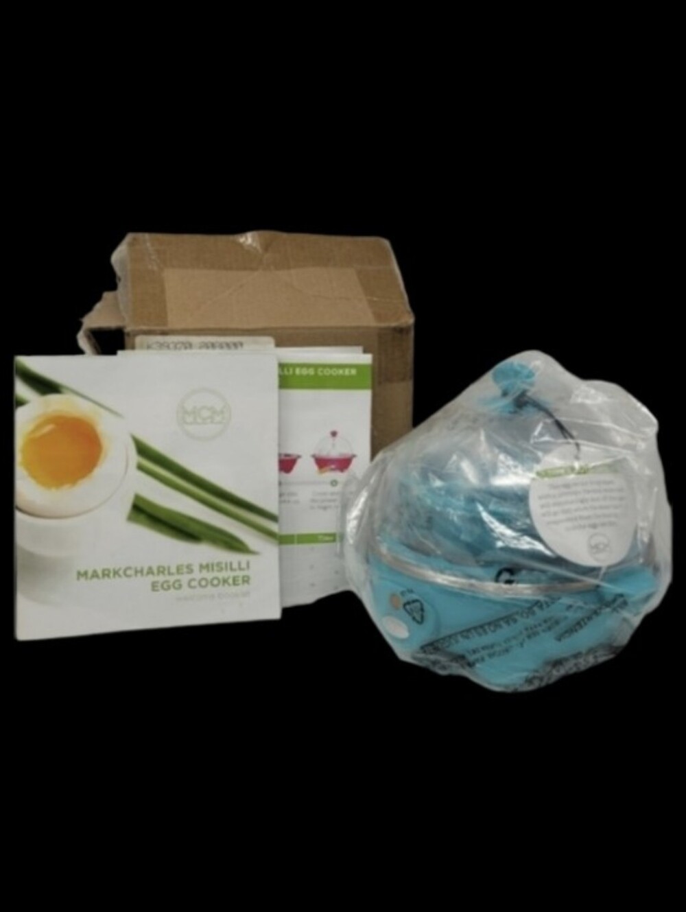 NIB EGGPRESS EGG COOKER AND POACHER WITH BELL